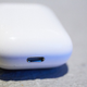 Floss or AirPods? The charging case is tiny, and looks just like a container of floss with a Lightning port on the bottom.